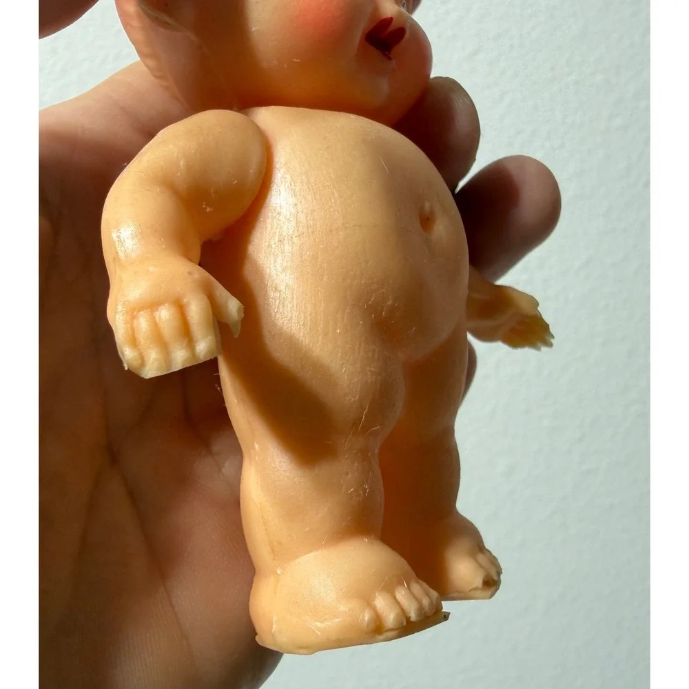 Vintage Japan Rubber Baby Doll Squeeze Toy Top Knot Bun Blue Eyes Kitsch 4.75in